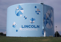 Lincoln Water System Reservoir with conservation message