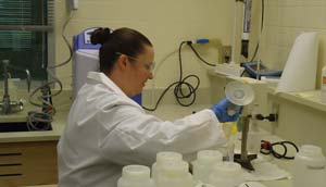Lincoln Water System laboratory specialist testing water