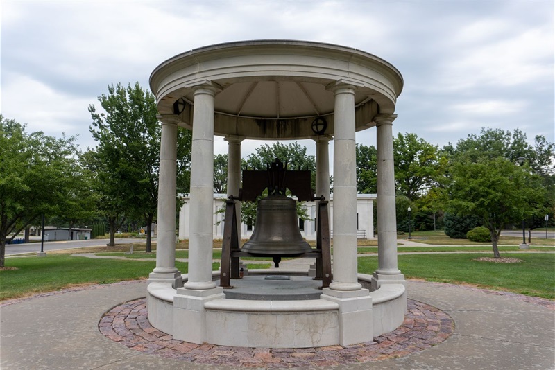 The back of the replica liberty bell with Auld Pavilion in the background.