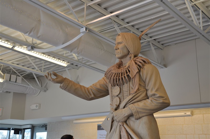 A close up of the top half of the clay casting of the Chief Standing Bear Sculpture in the workshop before bronze casting